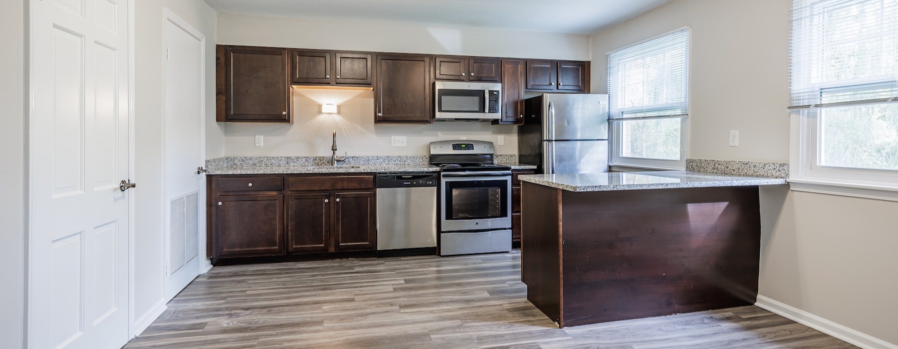 windows brighten kitchen and dining areas