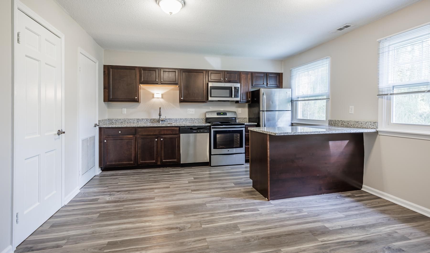 windows brighten kitchen and dining areas